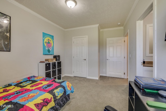 bedroom with carpet flooring, a textured ceiling, and ornamental molding