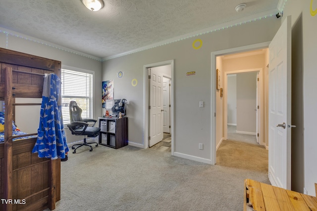 carpeted office space with a textured ceiling