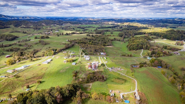 bird's eye view with a mountain view and a rural view