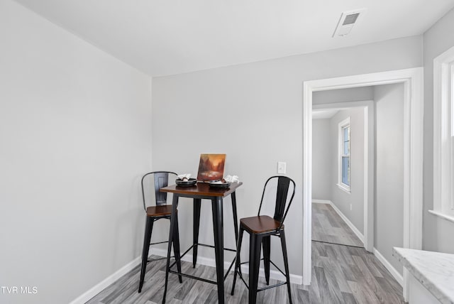 dining room featuring light hardwood / wood-style flooring