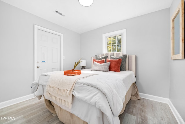 bedroom featuring light hardwood / wood-style flooring