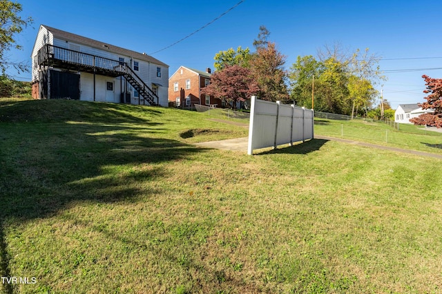 view of yard with a wooden deck