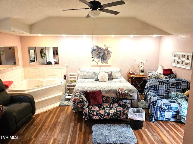 7503 Strawberry Mountain Rd, Wise, VA 24293 - bedroom featuring lofted ceiling, wood finished floors, a textured ceiling, and ceiling fan