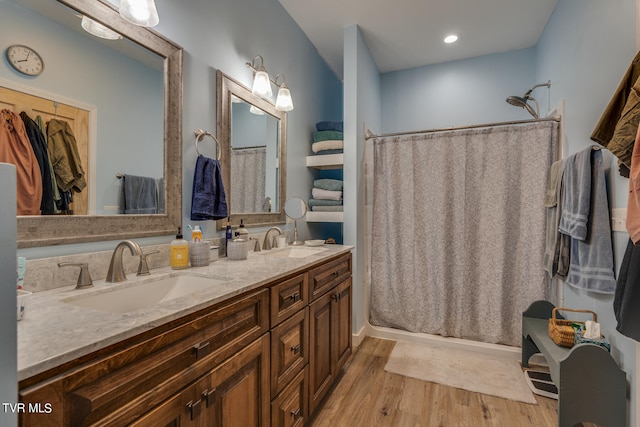 bathroom with vanity, hardwood / wood-style floors, and a shower with shower curtain