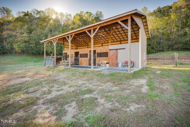 exterior space featuring an outbuilding