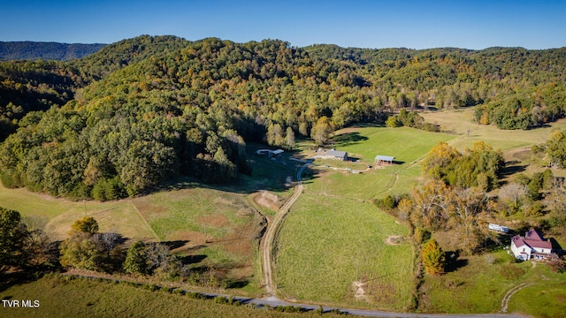 birds eye view of property featuring a rural view