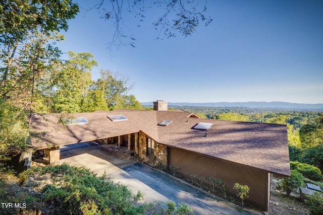 view of front of house with a mountain view