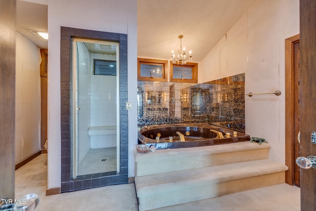 bathroom featuring a textured ceiling, shower with separate bathtub, and concrete flooring