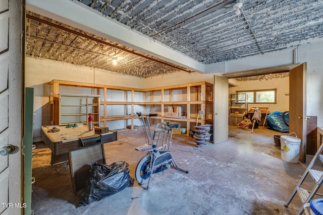 miscellaneous room with concrete flooring