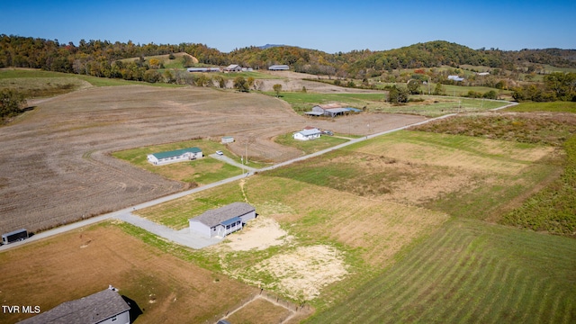 birds eye view of property featuring a rural view