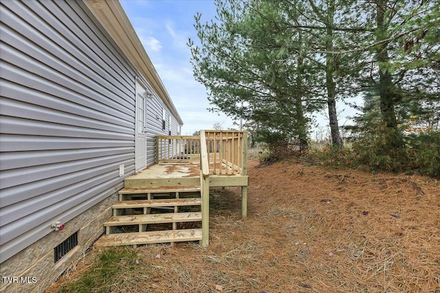 view of yard featuring a wooden deck