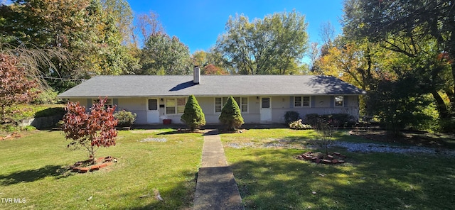 ranch-style house with a front yard