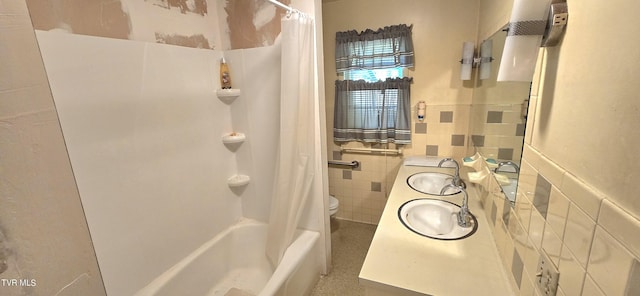 713 Woodhaven Dr, Johnson City, TN 37604 - bathroom featuring vanity, shower / bath combo, toilet, and tile walls
