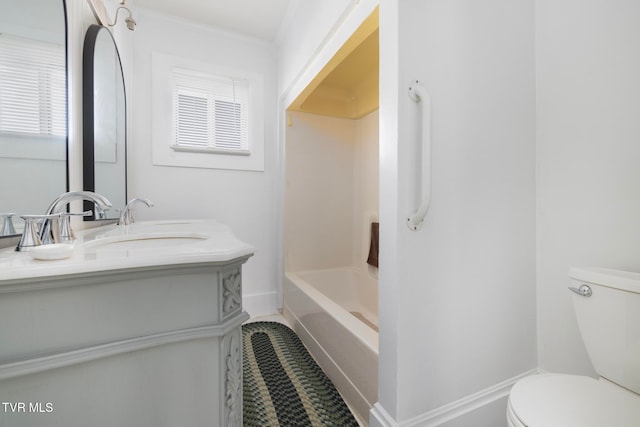 full bathroom featuring vanity, toilet, and shower / tub combination