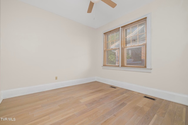 unfurnished room featuring light hardwood / wood-style floors and ceiling fan