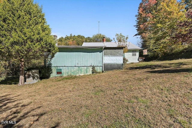 exterior space with a lawn