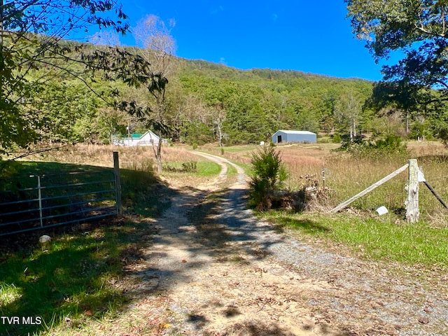 view of road featuring a rural view