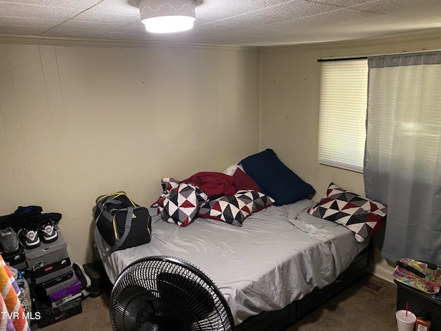 bedroom featuring carpet