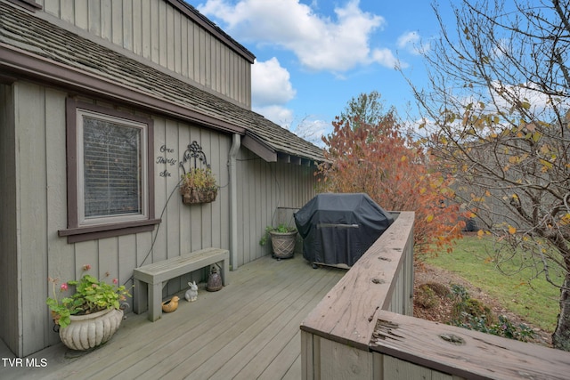 wooden terrace featuring grilling area