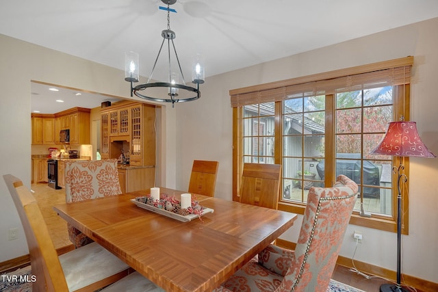 dining room with a notable chandelier