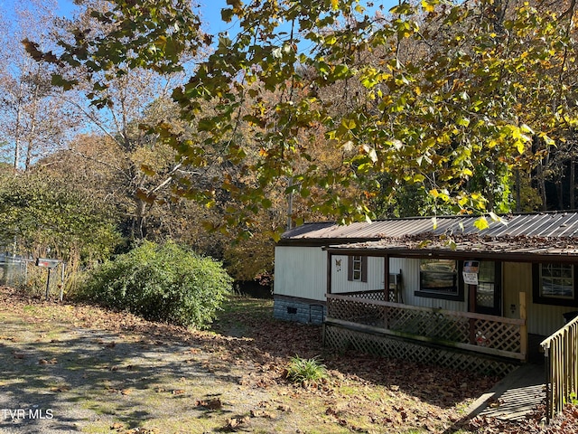 view of home's exterior with covered porch