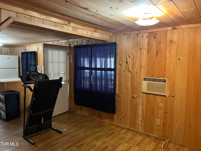 kitchen with wooden ceiling, wooden walls, and wood-type flooring