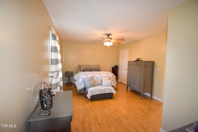 bedroom featuring ceiling fan and light wood-type flooring