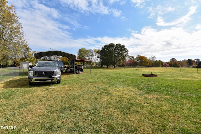 view of yard featuring a carport