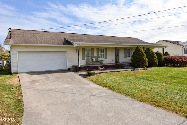 single story home with a front lawn, covered porch, and a garage