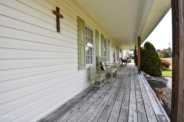 wooden deck with a porch