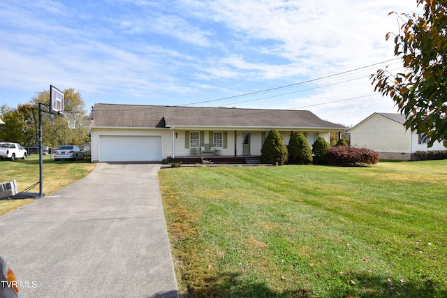 ranch-style house featuring a front yard, covered porch, and a garage