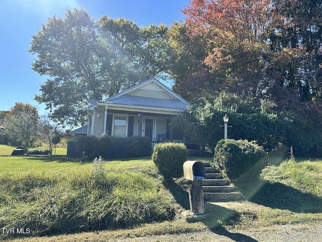 view of front of property with a front lawn