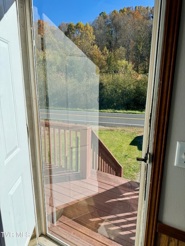 doorway featuring hardwood / wood-style flooring