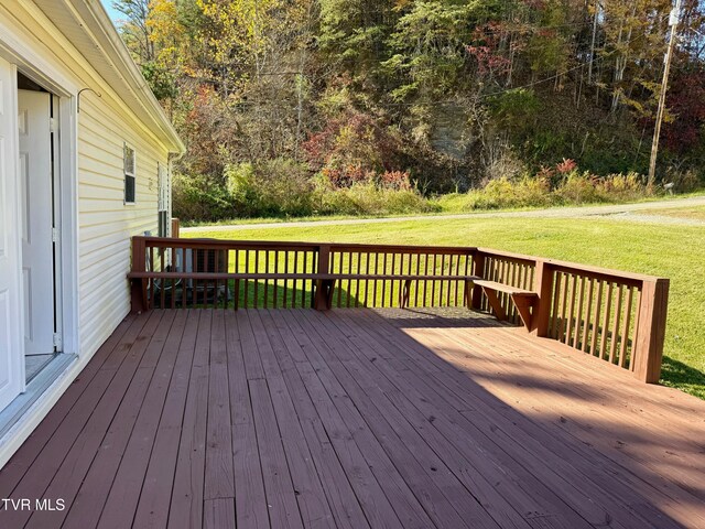 deck featuring a yard