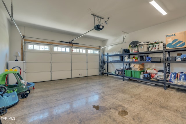 garage featuring a garage door opener