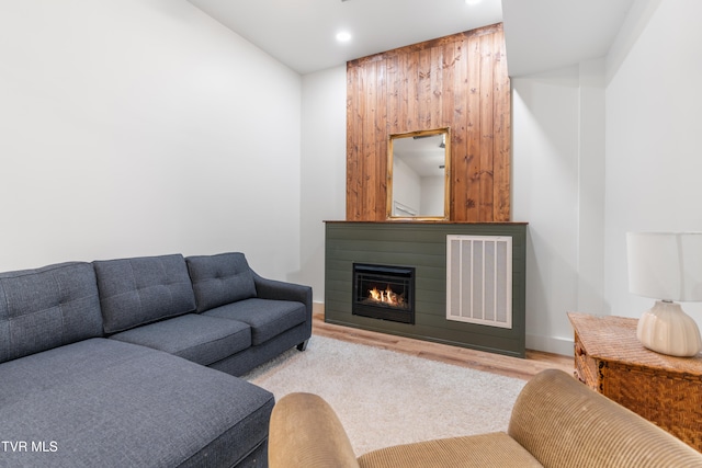 living room with light hardwood / wood-style floors