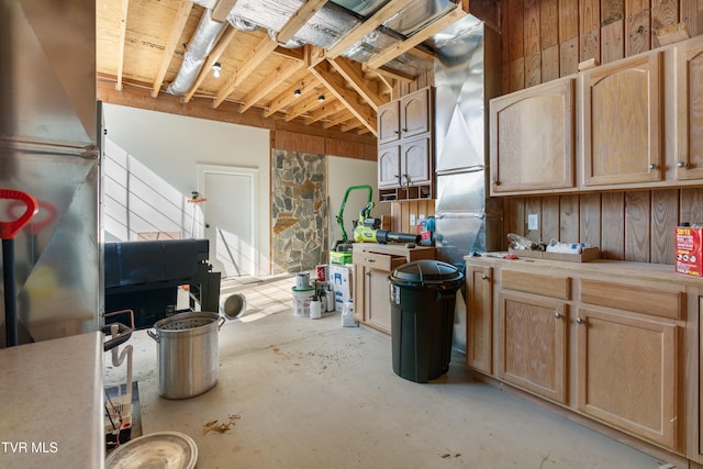 miscellaneous room featuring wooden walls