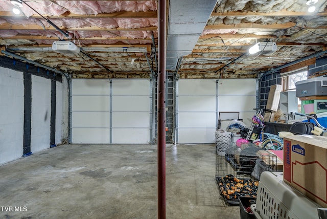 garage featuring a garage door opener