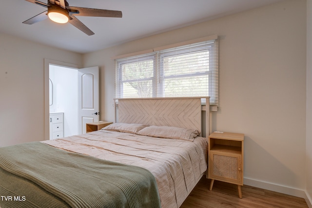 bedroom featuring ceiling fan and hardwood / wood-style floors