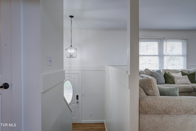 staircase with hardwood / wood-style floors