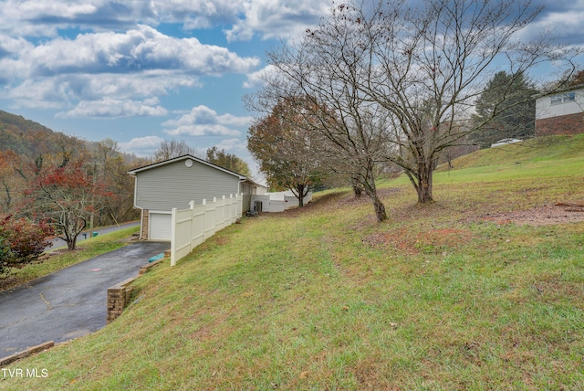 view of yard with a garage