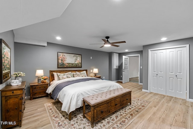 bedroom featuring baseboards, light wood-type flooring, and recessed lighting