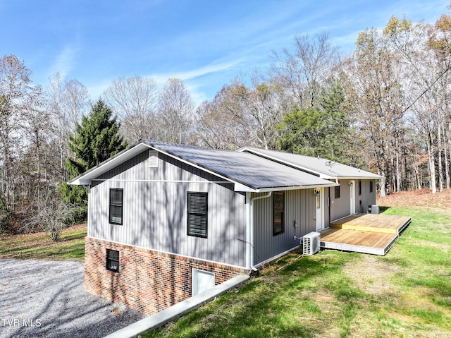 exterior space with a yard and a deck