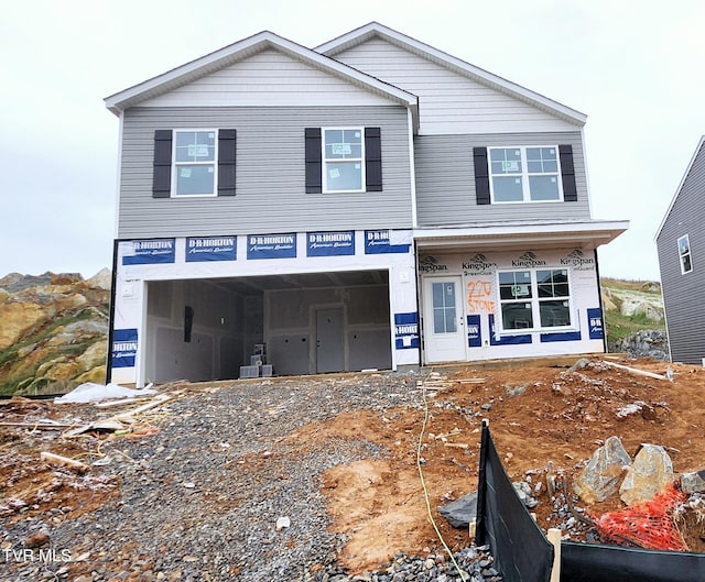 view of front of home featuring a garage