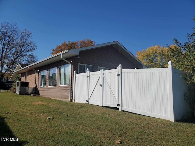 view of home's exterior featuring a yard