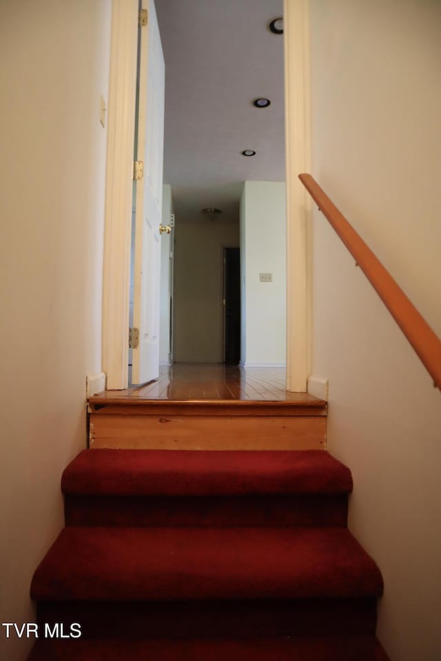 stairs with tile patterned flooring