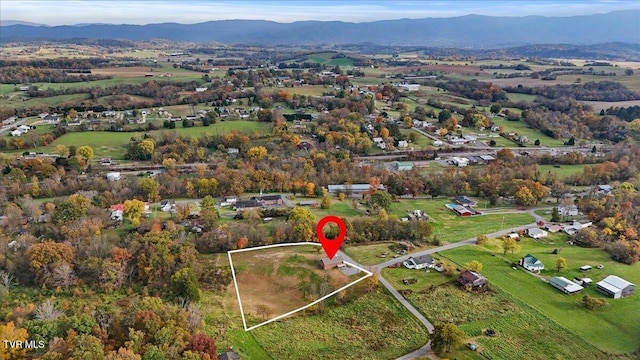 bird's eye view with a mountain view