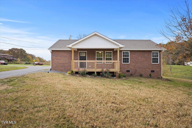 exterior space featuring a yard and covered porch