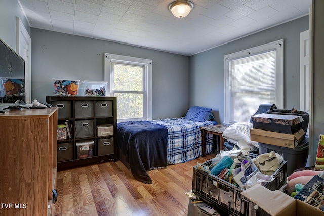 bedroom featuring hardwood / wood-style floors