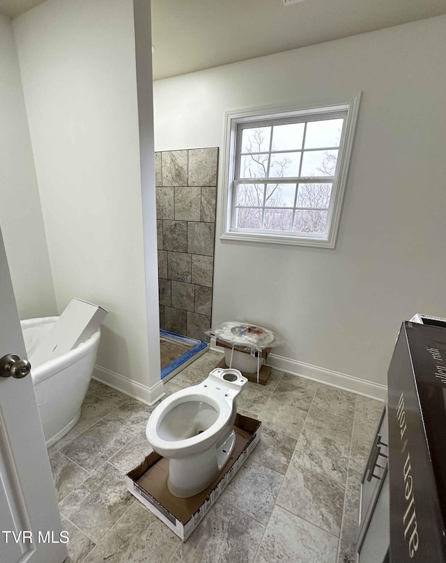 bathroom with shower with separate bathtub and toilet